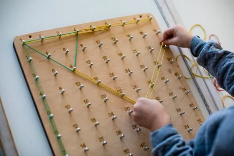 Geoboard for developing mathematical thinking and problem solving skills Stock Photos