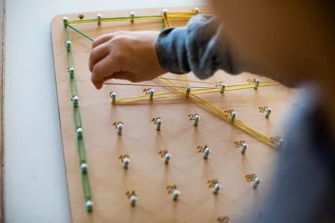 Geoboard for developing mathematical thinking and problem solving skills Stock Photos