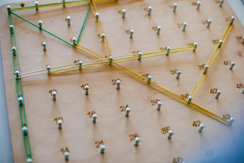 Geoboard for developing mathematical thinking and problem solving skills Stock Photos