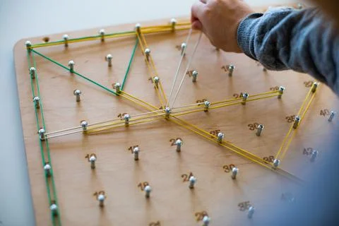 Geoboard for developing mathematical thinking and problem solving skills Stock Photos