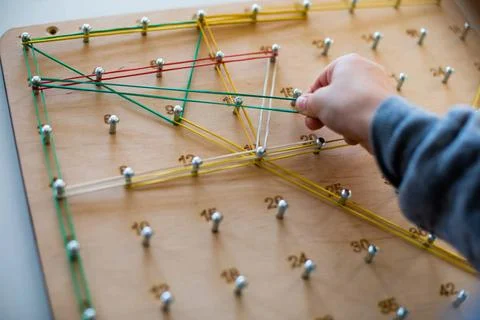 Geoboard for developing mathematical thinking and problem solving skills C... Stock Photos
