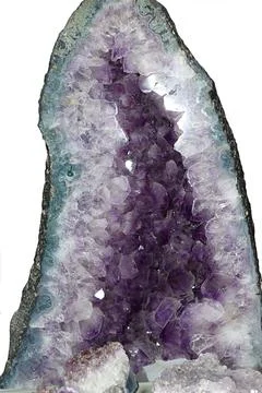 Geode with amethyst isolated on white background. Stock Photos