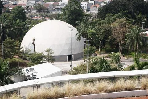 Geodesic Dome in Lush Urban Park Stock Photos