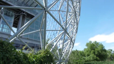 Geodesic dome under a clear and cloudy sky Stock Footage 130027117