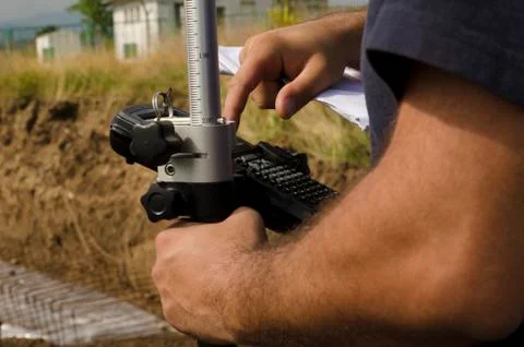 Geodesist working with gps Stock Photos