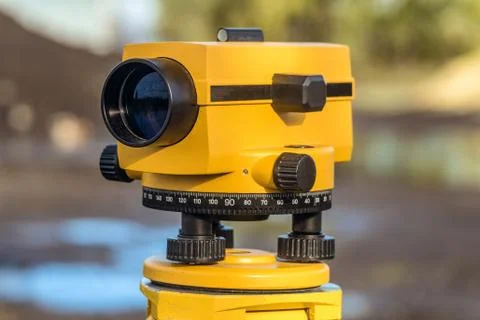 Geodetic optical level. Construction engineering equipment. Stock Photos
