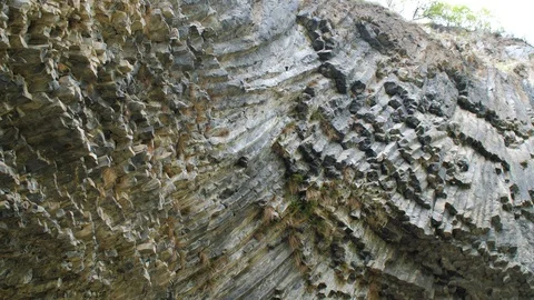 Geological Formation of Octogonal Basalt Columns in rock, Garni Gorge Mountain,  Stockbeeldmateriaal 90095632
