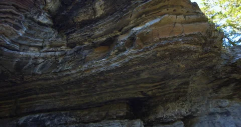 Geological rocks vaulted top cavern /Grotte des fees /Saint-Leandre /Pan left Stock Footage 130919031