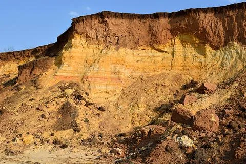 Geological section with horizontal layers of sand and clay. Stock Photos