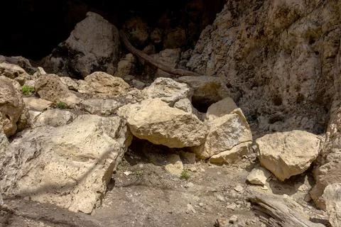 Geological structure of a section of rocky soil in a mining quarry Stock Photos