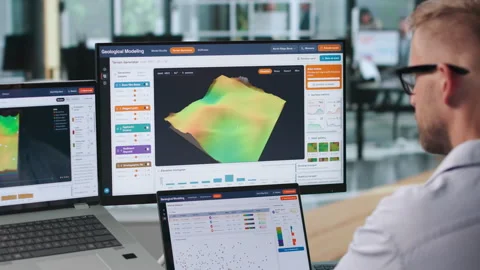 Geologist Examines 3D Subsurface Model Using Laptop Stock Footage 347284075