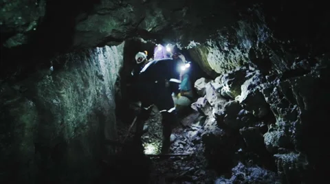Geologist inside cave Stock Footage 34530054