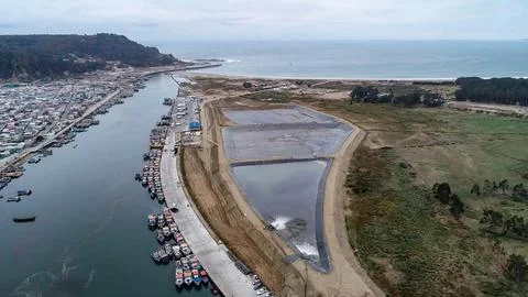 Geomembrane deployment and installation process with machinery in the const.. Stock Photos