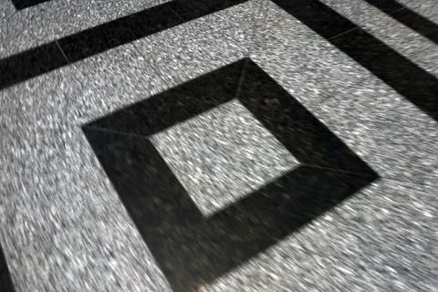 Geometric Abstract Art with Square Patterns on Granite Surface Stock Photos