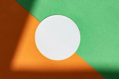 Geometric abstract composition with green, orange, and white circle Stock Photos