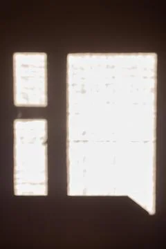 Geometric abstraction, shadow of a window on light wall on sunny day Foto stock