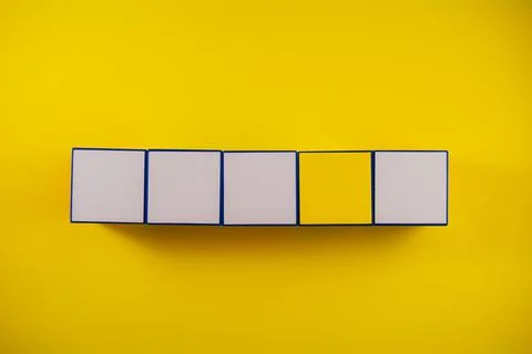 Geometric background of square shapes in white and yellow colors Stock Photos
