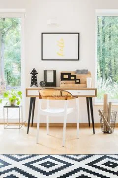Geometric carpet in simple workspace Stock-Fotos