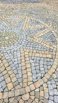 Geometric cobblestone pavement pattern top view texture Stock Photos