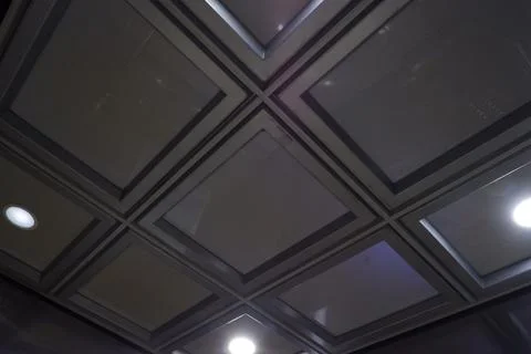 Geometric Coffered Ceiling with Recessed Lights Foto stock