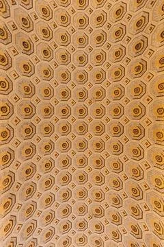 Geometric coffered ceiling with repeating circular decorative motifs, Vatic.. Stock Photos