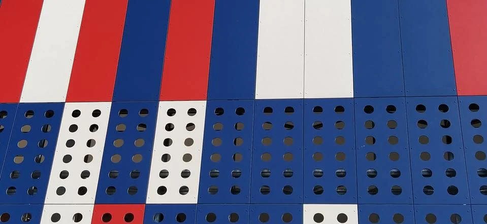 Geometric colored elements of the building facade with planes, lines and hole Stock Photos
