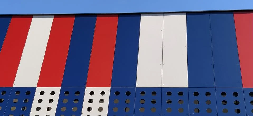 Geometric colored elements of the building facade with planes, lines and hole Stock Photos