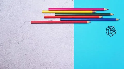 Geometric composition with colored crayons. Stock Photos