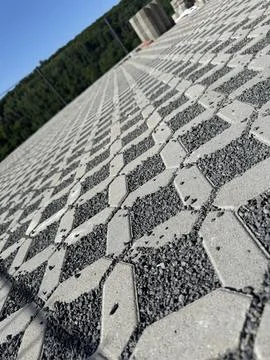 Geometric Concrete Block Pattern in Outdoor Setting 写真素材
