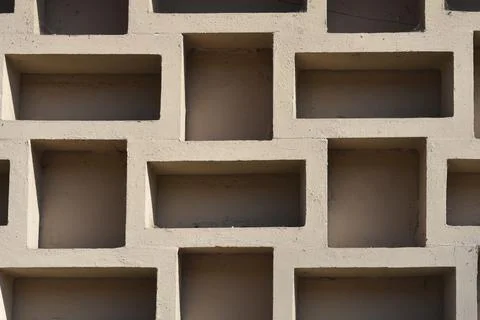 Geometric Concrete Wall with Rectangular Hollows 스톡 사진