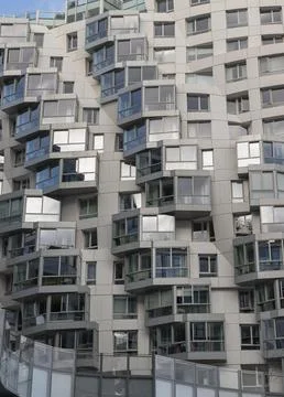 Geometric design on a modern building complex with repeating structure. Stock Photos