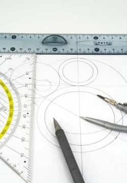 Geometric drawings and drawing instruments. Stock Photos