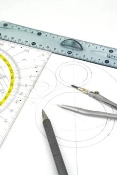 Geometric drawings and drawing instruments. Stock Photos