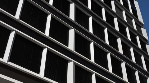 Geometric facade of modern office building with white window frames Stock Footage 331581975