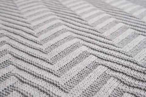 Geometric grey knitted background Stock Photos