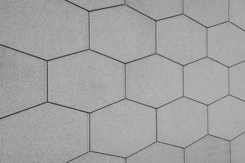 Geometric Hexagon Tile Wall Pattern in Grey Concrete Nov 24 2025 스톡 사진