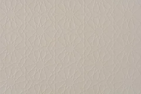Geometric Islamic Pattern on Textured Beige Surface Stock Photos