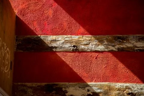 Geometric light and shadow patterns displayed on the wall Stock Photos