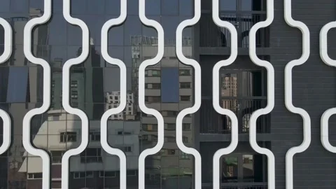 Geometric mirror wall of modern building close-up, modern architecture Stock Footage 148609668