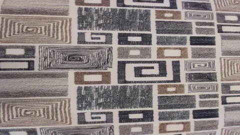 Geometric modern pattern on fabric with square motifs and spirals Stock Footage 345431428