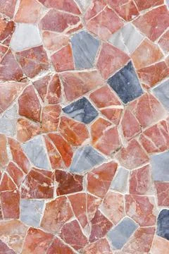 Geometric mosaic texture with multi-colored tiles on floor Stock Photos