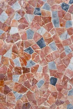 Geometric mosaic texture with multi-colored tiles on floor Foto stock
