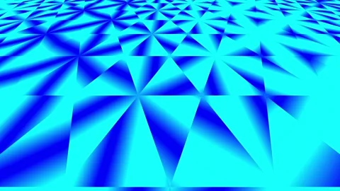 A geometric pattern of blue triangles radiating from a central point, creat.. Stock Footage 305962616