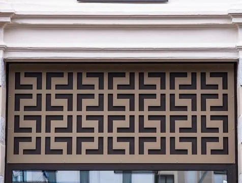 Geometric pattern on building facade 스톡 사진