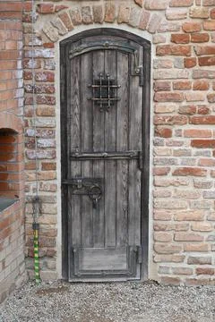 Geometric pattern of doors on an old castle Stock Photos