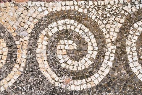 Geometric pattern of floor mosaic of an ancient house in Paphos town Stock Photos