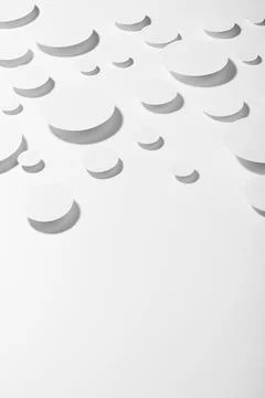 Geometric pattern of flying white ovals in hard light with strict light grey  Stock Photos