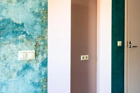 Geometric pattern of green and pink walls in home Stock Photos