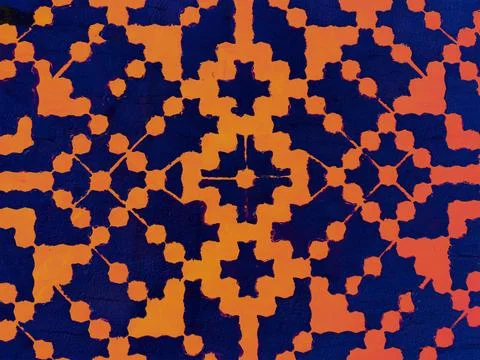 Geometric pattern with orange ethnic ornament on blue background 스톡 일러스트