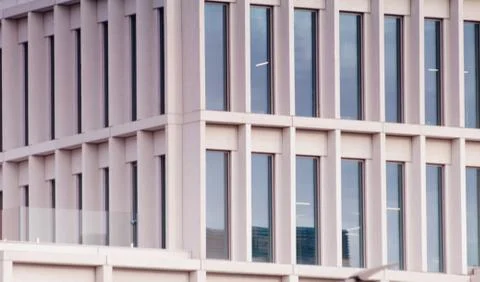 Geometric pattern from part of building facade. Modern architecture of Stock Photos